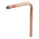 A copper pipe with a flame on it.