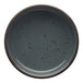 A close up of a dark grey International Tableware Lunar Blue Sauce Dish with speckled dots.