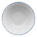 A white porcelain bowl with blue speckles.