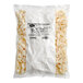 A bag of white candy with Albanese White Strawberry Banana Gummi Bears on a white background.