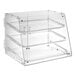 A clear acrylic bakery display case with three shelves and rear doors.