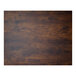 A BFM Seating Relic rectangular melamine table top with a dark wood surface and dark grain.