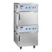 A large stainless steel Cooking Performance Group SlowPro stacked cook and hold oven with two doors.