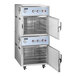 A large Cooking Performance Group SlowPro stacked cook and hold oven with doors open.