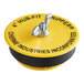 A yellow Cherne gripper plug cap with black text reading "4" Hub-Fit"