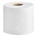 A roll of Tork 2-ply toilet paper.