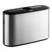 A silver and black rectangular Tork Elevation Xpress stainless steel countertop hand towel dispenser.