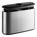 A silver and black Tork Elevation stainless steel countertop hand towel dispenser.