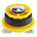 A yellow and black plastic Cherne End of Pipe Gripper plug with a metal wheel.