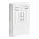 A white rectangular Tork wall mount with small holes for hand towels.