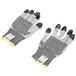A pair of Cordova Monarch cut-resistant work gloves with white fabric and black rubber dots on the palms.