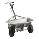 A silver stainless steel wheelbarrow with a handle.