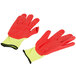 A pair of yellow Cordova cut-resistant gloves with red foam nitrile palms and yellow handles.