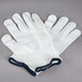 A pair of small white Cordova work gloves with blue trim.