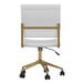 The back of a Martha Stewart white faux leather swivel office chair with gold legs.