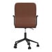 A back view of a Martha Stewart brown faux leather office chair with black wheels.