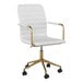 A Martha Stewart white faux leather office chair with gold accents.