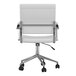 A Martha Stewart white faux leather office chair with metal legs and wheels.