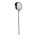 A Sola the Netherlands stainless steel soup spoon with a long handle.