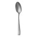 A close-up of a Sola the Netherlands stainless steel dessert spoon with a silver handle.