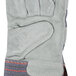 A pair of Cordova warehouse work gloves with a gray leather palm and blue stitching.