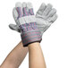 A pair of Cordova work gloves with blue and red stripes on a white background.