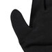 A black Cordova ActivGrip Advance warehouse glove with a black nitrile palm coating on a white background.