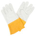 A pair of white Cordova leather gloves with yellow cuffs.