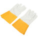 A pair of yellow leather gloves with white and yellow cuffs.