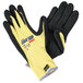 A pair of yellow and black Cordova ActivGrip Advance Kevlar gloves.