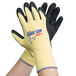 A pair of Cordova Kevlar gloves with black and yellow palm coating.
