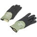A pair of Cordova small cut-resistant work gloves with black foam nitrile palms and black and green fabric.