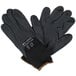 A pair of Cordova black nylon gloves with black foam nitrile/polyurethane palms.