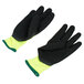 A pair of black loop-in terry gloves with green trim.