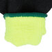 A yellow and green Cordova warehouse glove with black foam latex coating.