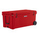 A red CaterGator outdoor cooler with black wheels and handles.