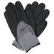 A pair of Cordova gray warehouse gloves with black nitrile dots on the palm and fingers.