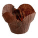 A Baker's Mark brown paper cupcake wrapper with a rounded shape.