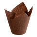 A Baker's Mark chocolate brown tulip baking cup with a brown paper wrapper.