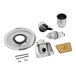 A round metal Delta shower trim kit with a white and black circle.