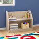 A Flash Furniture wooden 2-shelf display unit with toys on it in a white room.