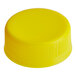 A yellow plastic tamper-evident cap.