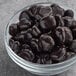 A bowl of Albanese dark chocolate covered dried cherries.