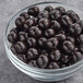 A bowl of Albanese dark chocolate covered espresso beans.