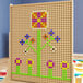 A Flash Furniture screw accessory pack with colorful flower designs on wooden pegs.