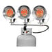 A close-up of a Mr. Heater Triple Burner Liquid Propane Tank Top Heater with three orange lights and a metal grill.