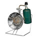 A Mr. Heater liquid propane tank top heater with a green metal cage over a green propane cylinder.