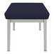 A Lesro navy fabric bench with metal legs.
