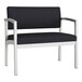 A black and white Lesro Lenox bariatric guest chair with a black frame.