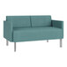 A teal Lesro Luxe Lounge loveseat with steel legs.